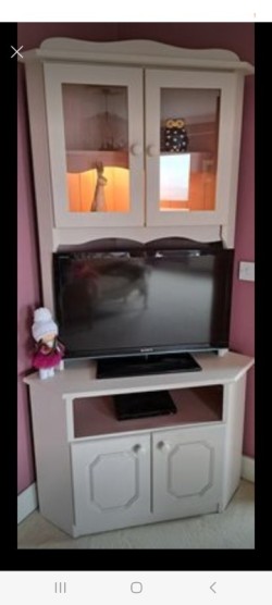 Lovely Tall Tv, display (with light), storage unit. 