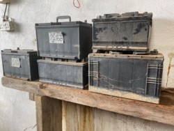 Five Old Tractor Batteries  
