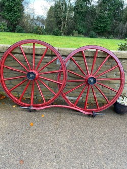 Pair of Large Trap Wheels and Axle. 