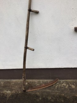 Wooden handle scythe 